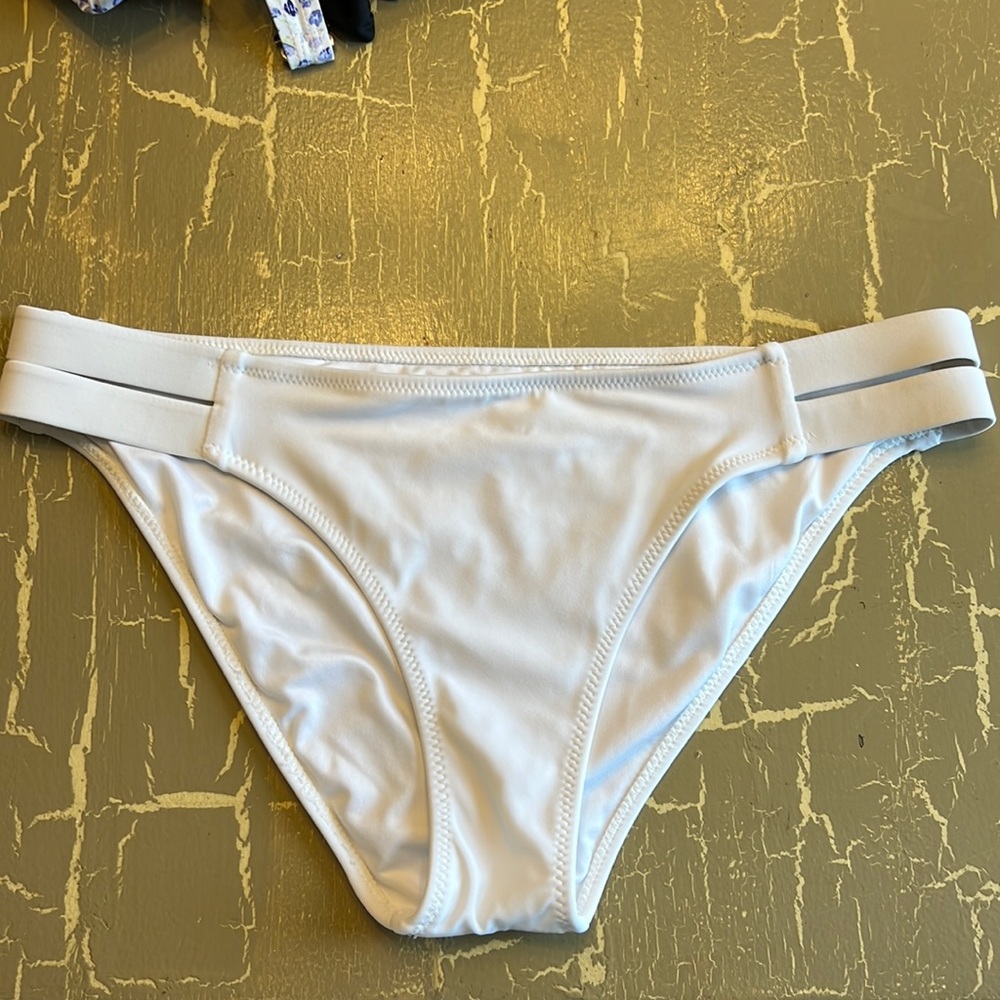White shade and shore bikini bottoms.